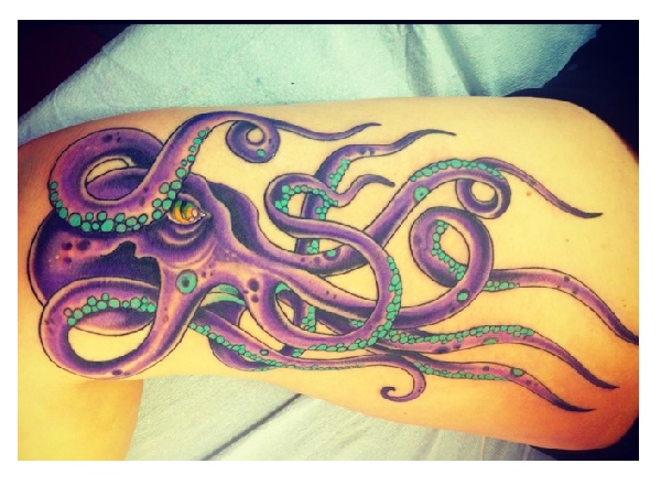 Purple Ink Octopus Tattoo On Left Upper Leg