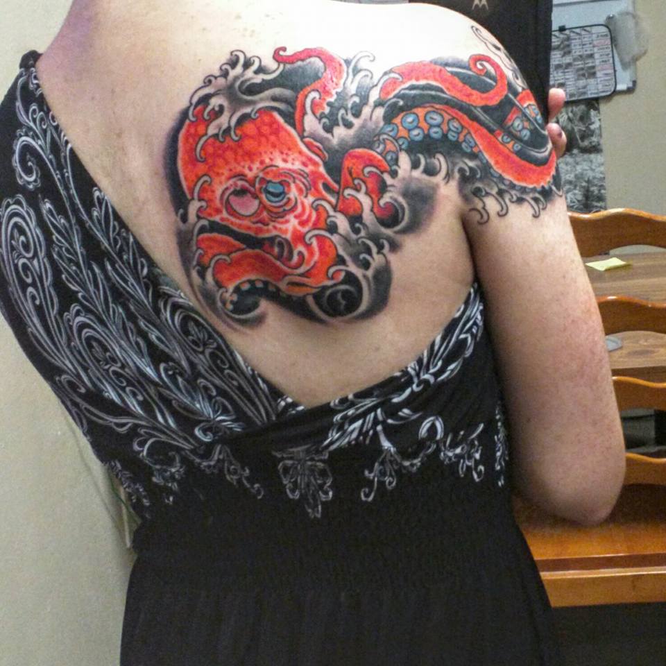 Red Ink Japanese Octopus Tattoo On Girl Right Back Shoulder