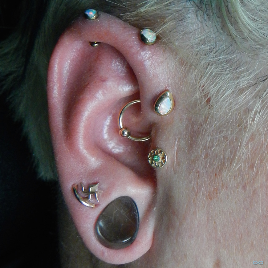 Right Ear Dual Lobe And Inner Pinna Piercing
