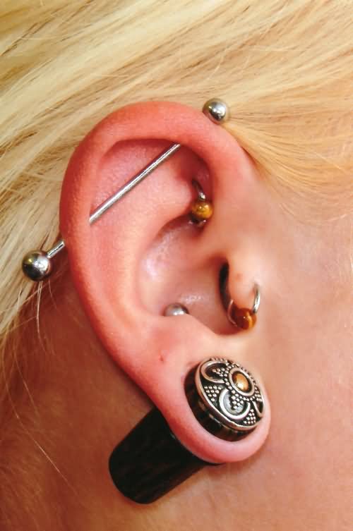 Right Ear Lobe And Industrial Piercing