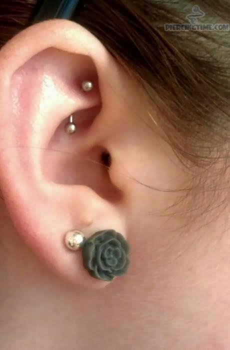 Right Ear Lobe And Rook Piercing With Curved Barbell