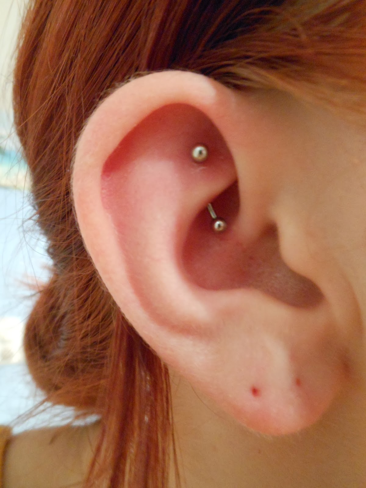 Right Ear Rook Piercing With Silver Barbell