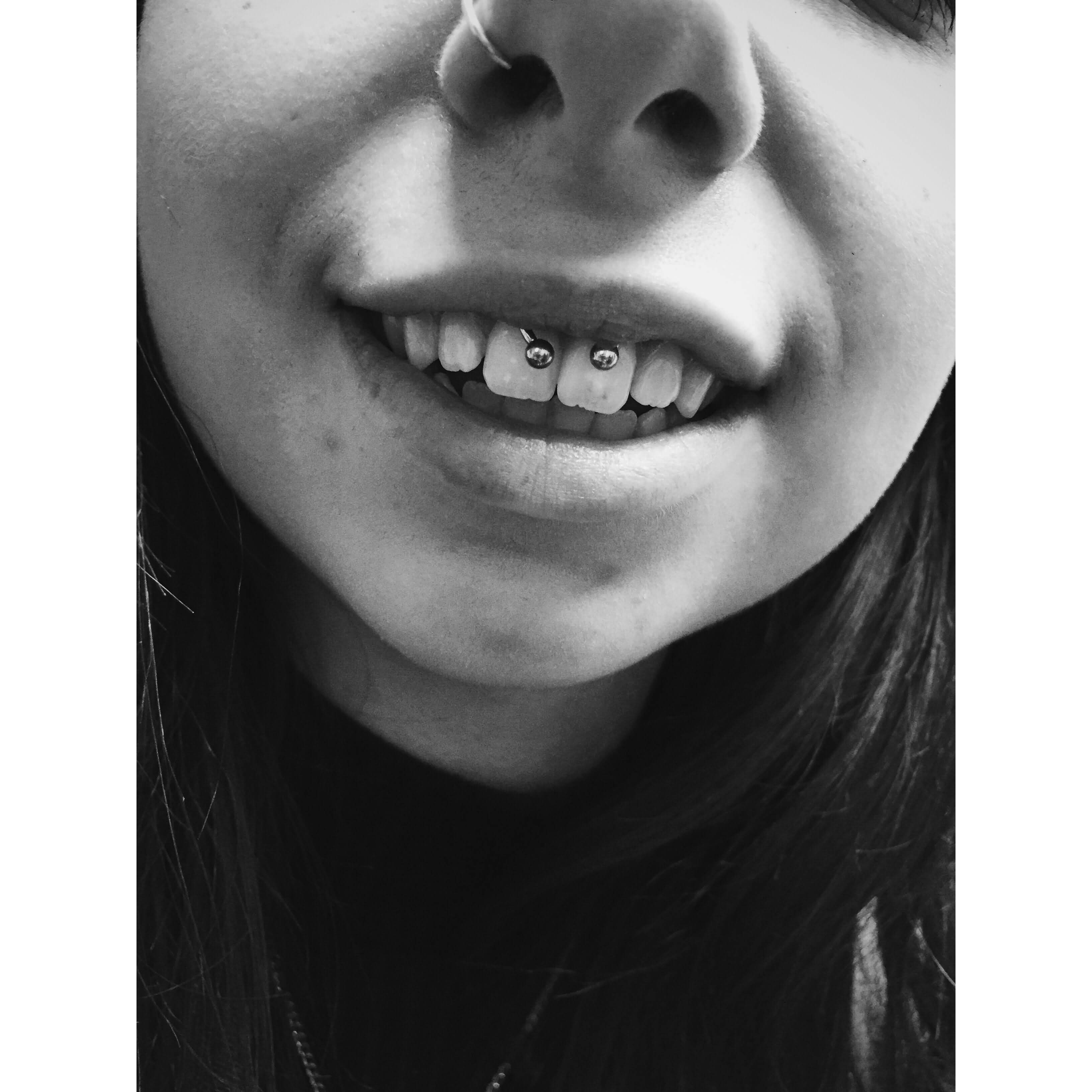 Right Nostril And Circular Barbell Smiley Piercing