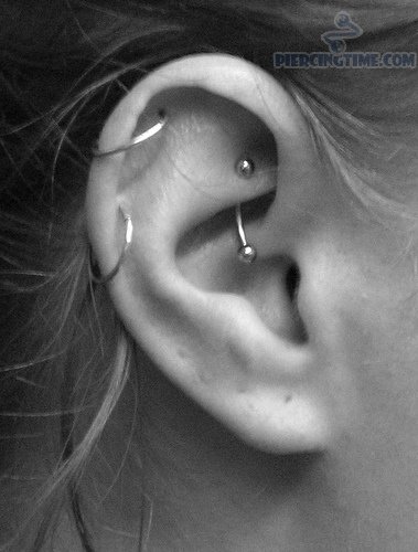 Rook Piercing With Silver Curved Barbell