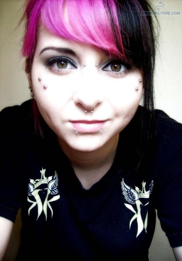 Septum, Lower Lip And Butterfly Kiss Piercing