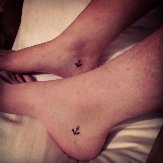 Simple Black Anchor Tattoo On Couple Right Foot Ankle