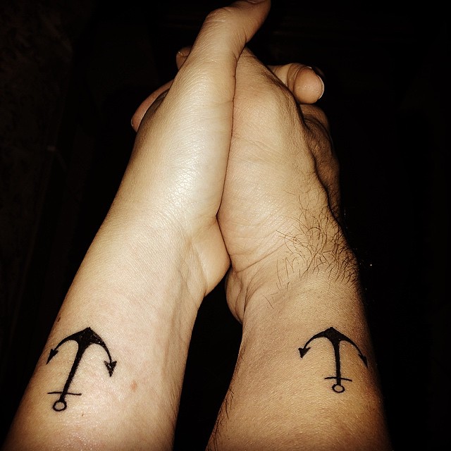 Simple Black Anchor Tattoo On Couple Side Wrist