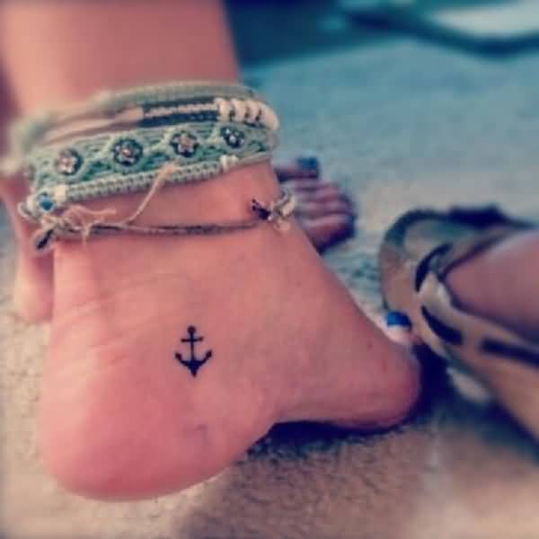 Simple Black Anchor Tattoo On Girl Left Ankle