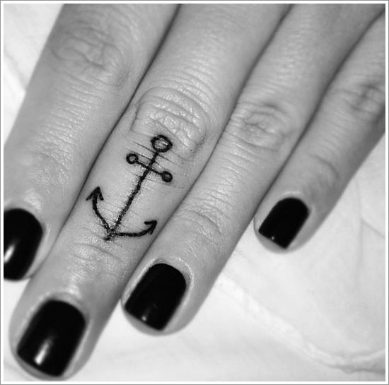 Simple Black Anchor Tattoo On Girl Left Finger