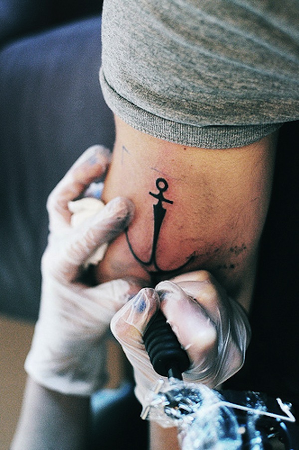 Simple Black Anchor Tattoo On Left Half Sleeve