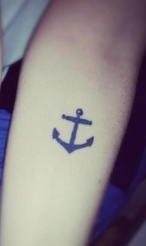 Simple Black Anchor Tattoo On Left Wrist