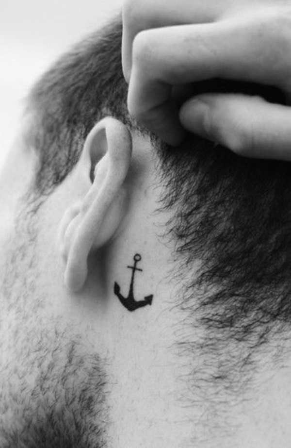 Simple Black Anchor Tattoo On Man Left Behind The Ear