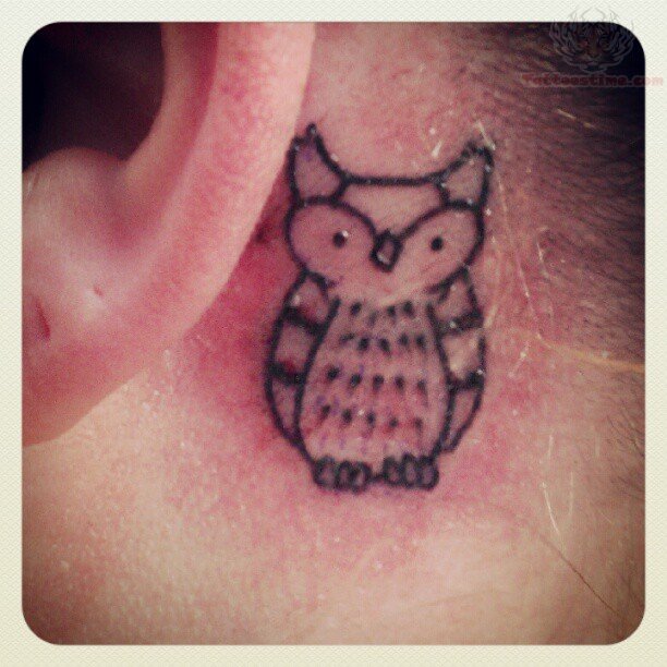 Simple Black Outline Owl Tattoo On Behind The Ear