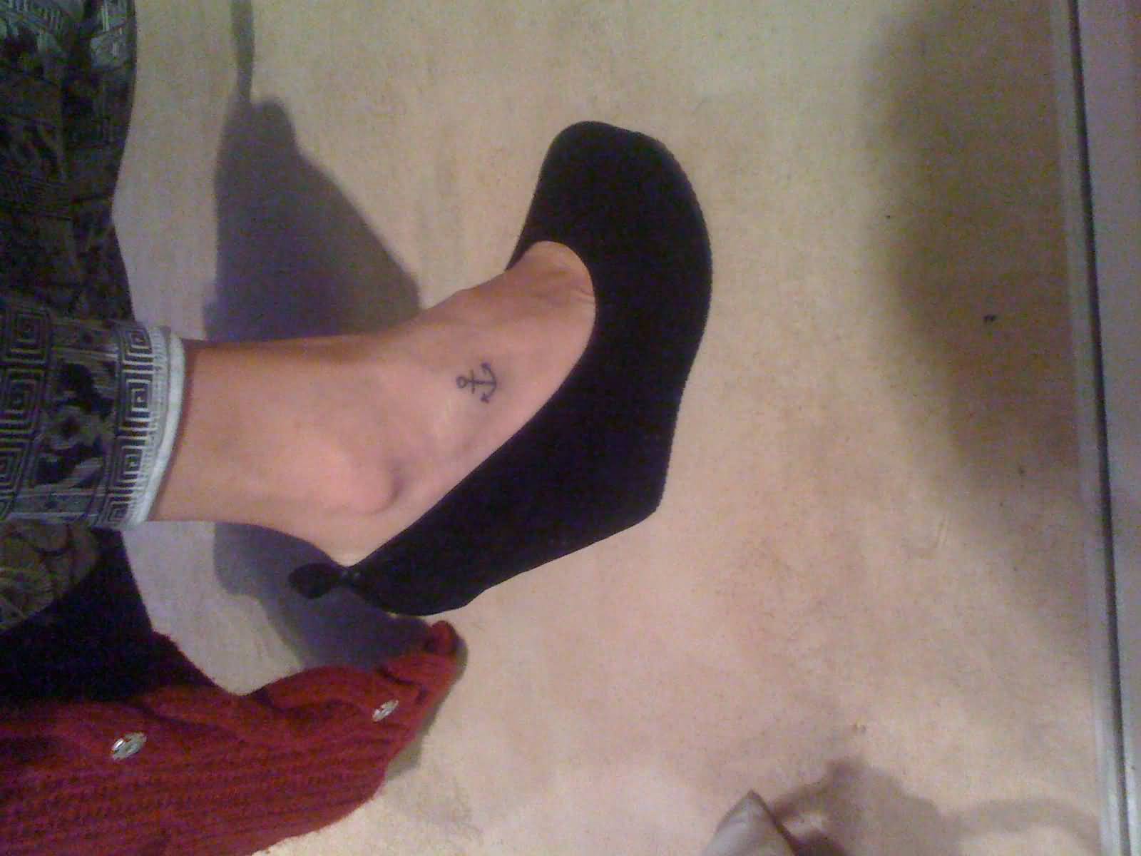 Small Black Anchor Tattoo On Girl Right Foot