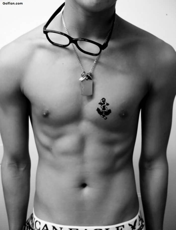 Small Black Anchor Tattoo On Man Chest