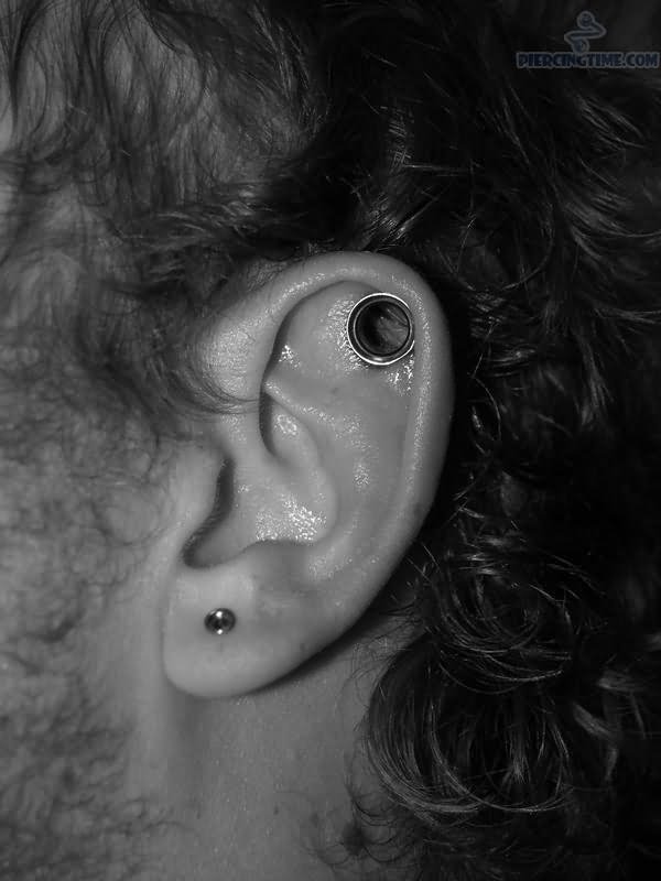 Small Gauge Lobe And Dermal Punch Piercing For Men