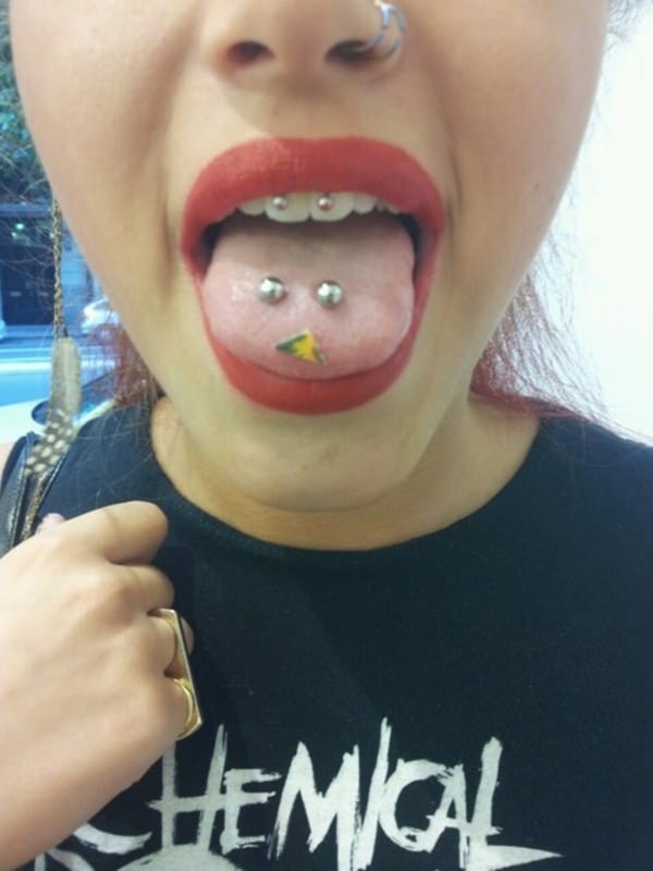 Smiley And Surface Tongue Piercing