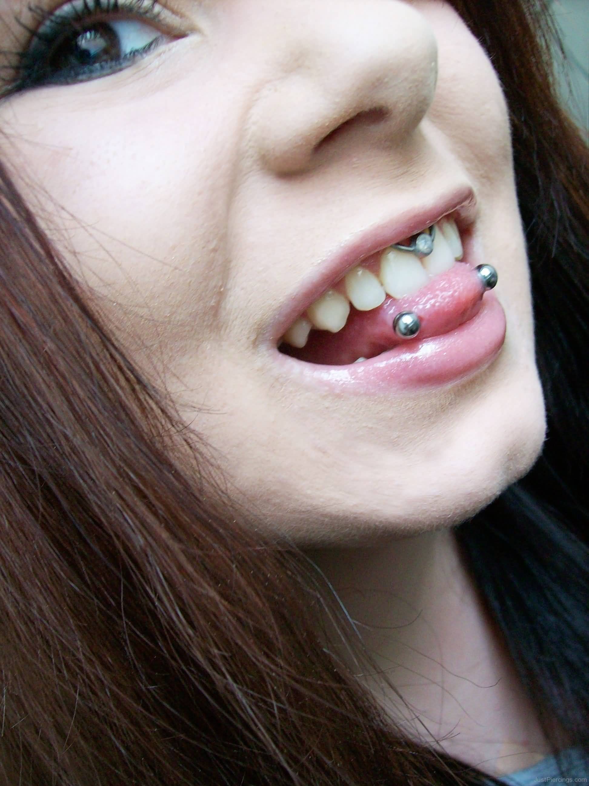 Surface Tongue And Smiley Piercing