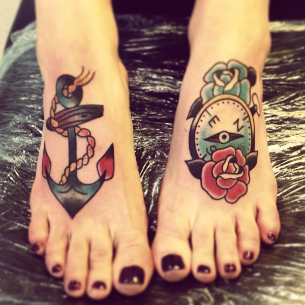 Traditional Anchor And Compass With Roses Tattoo On Girl Feet