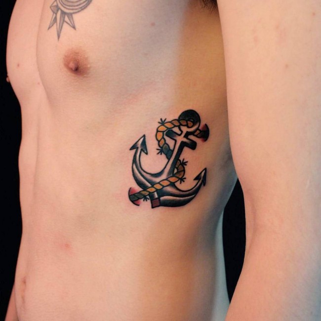 Traditional Anchor Tattoo On Man Left Side Rib