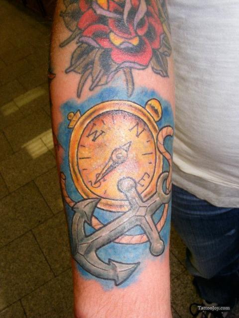 Traditional Colorful Anchor With Compass Tattoo On Right Forearm