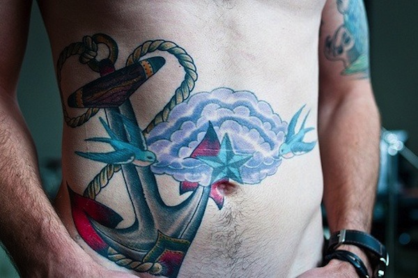 Traditional Colorful Anchor With Flying Birds Tattoo On Man Right Side Rib