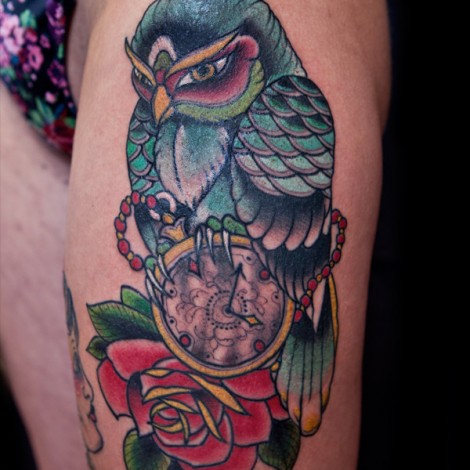 Traditional Colorful Owl With Clock And Rose Tattoo On Left Thigh
