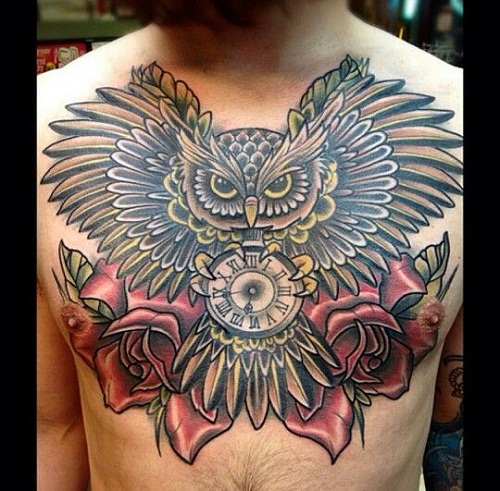 Traditional Flying Owl With Clock And Roses Tattoo On Man Chest