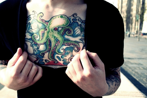 Traditional Octopus Tattoo On Girl Chest