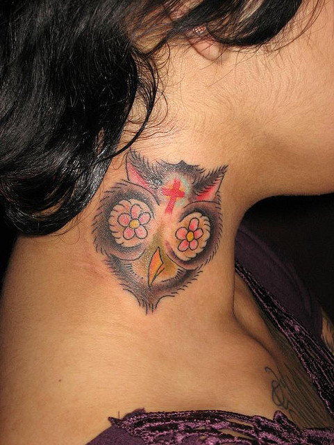 Traditional Owl Head Tattoo On Girl Side Neck
