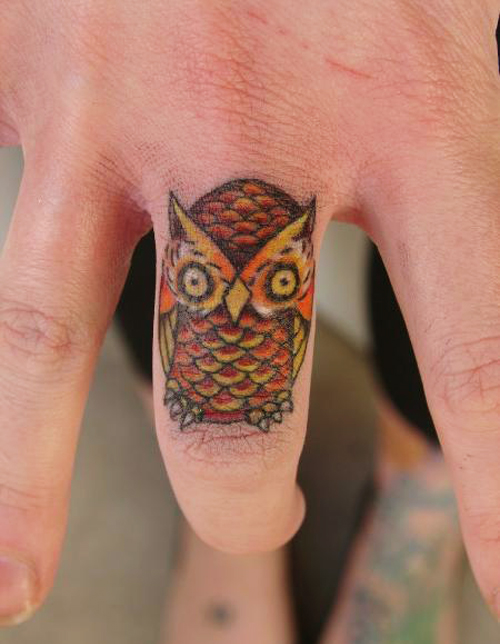 Traditional Owl Tattoo On Finger