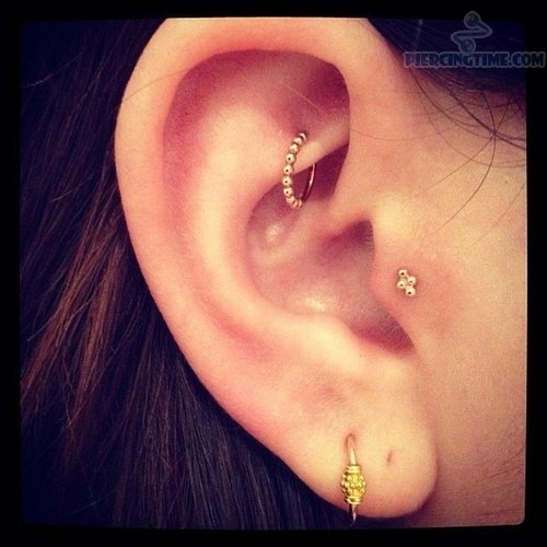 Tragus And Rook Piercing On Right Ear