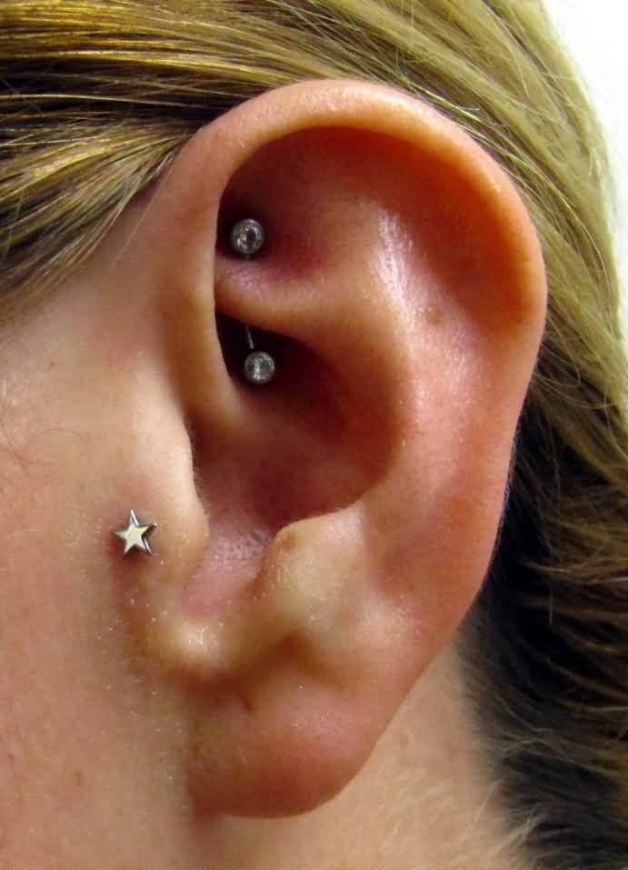 Tragus And Rook Piercing With Curved Barbell