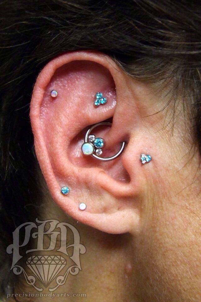 Tragus Piercing With Daith And Rook Piercing