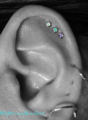 Triple Cartilage Piercing On Left Ear