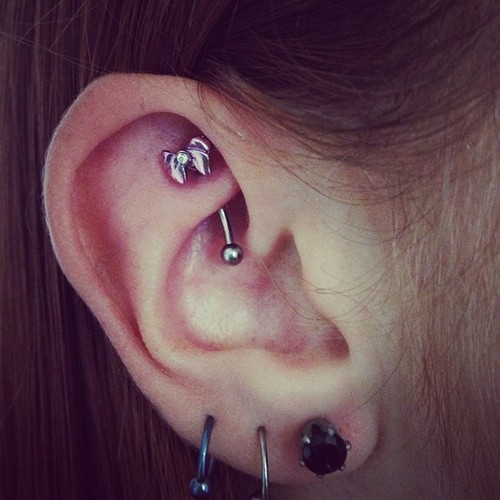 Triple Lobe Piercing And Rook Piercing For Girls