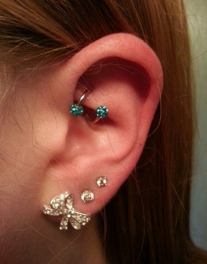Triple Lobes And Rook Piercing With Spiral Ring