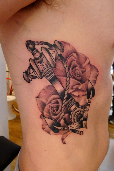 Unique Anchor With Roses Tattoo On Side Rib