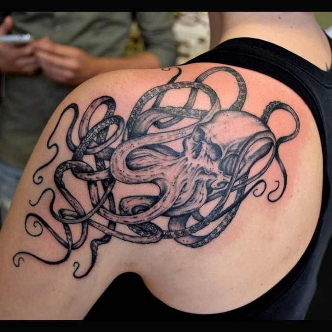 Unique Black Ink Octopus Tattoo On Man Left Back Shoulder