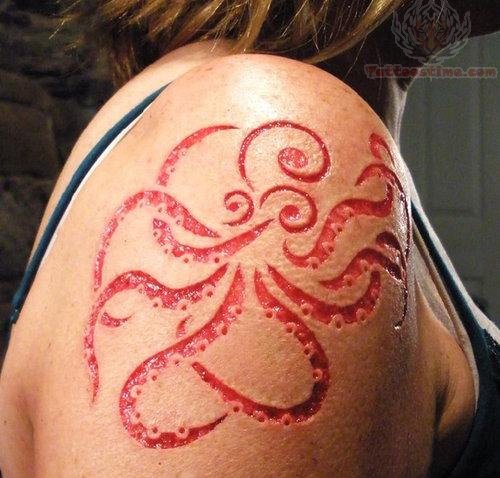 Unique Red Ink Octopus Tattoo On Women Right Shoulder