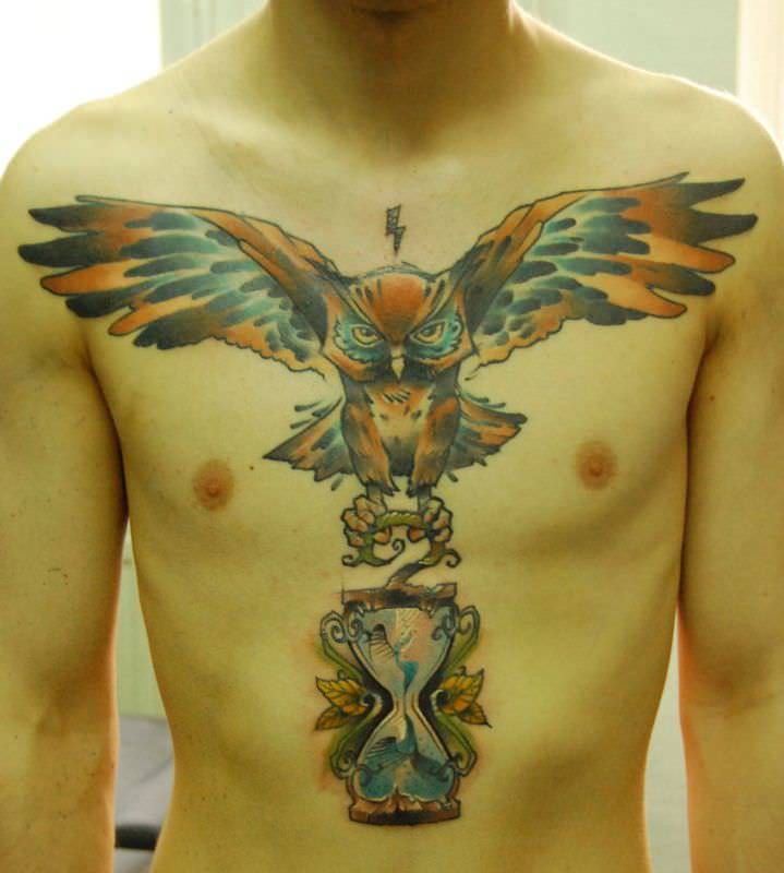 Watercolor Owl With Hourglass Tattoo On Man Chest By Berlin