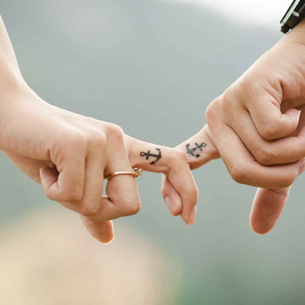 Wonderful Anchor Tattoo On Couple Finger