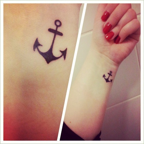 Wonderful Black Anchor Tattoo On Girl Left Wrist