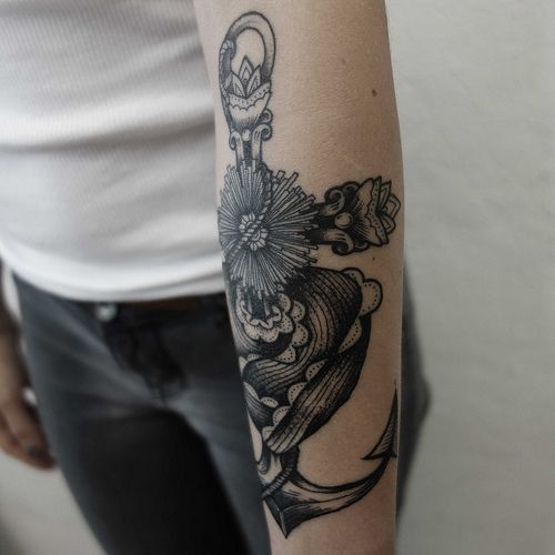 Wonderful Black And Grey Anchor With Flowers Tattoo On Left Forearm