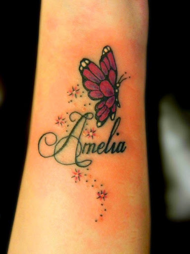 Amelia Butterfly And Star Tattoos On Forearm