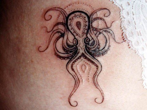 Attractive Black Small Octopus Tattoo Design