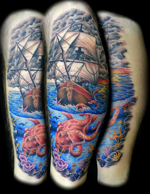 Attractive Colorful Octopus With Ship Tattoo Design For Leg Calf