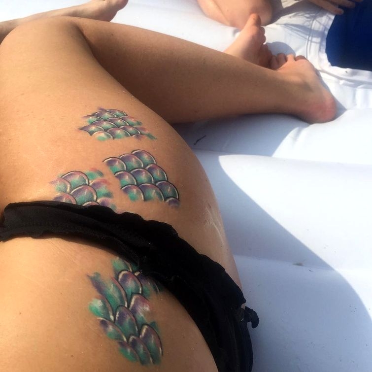 Attractive Mermaid Scale Tattoo On Girl Right Hip