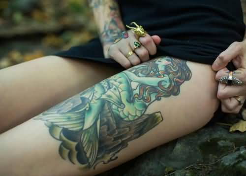 Attractive Mermaid Tattoo On Girl Left Thigh