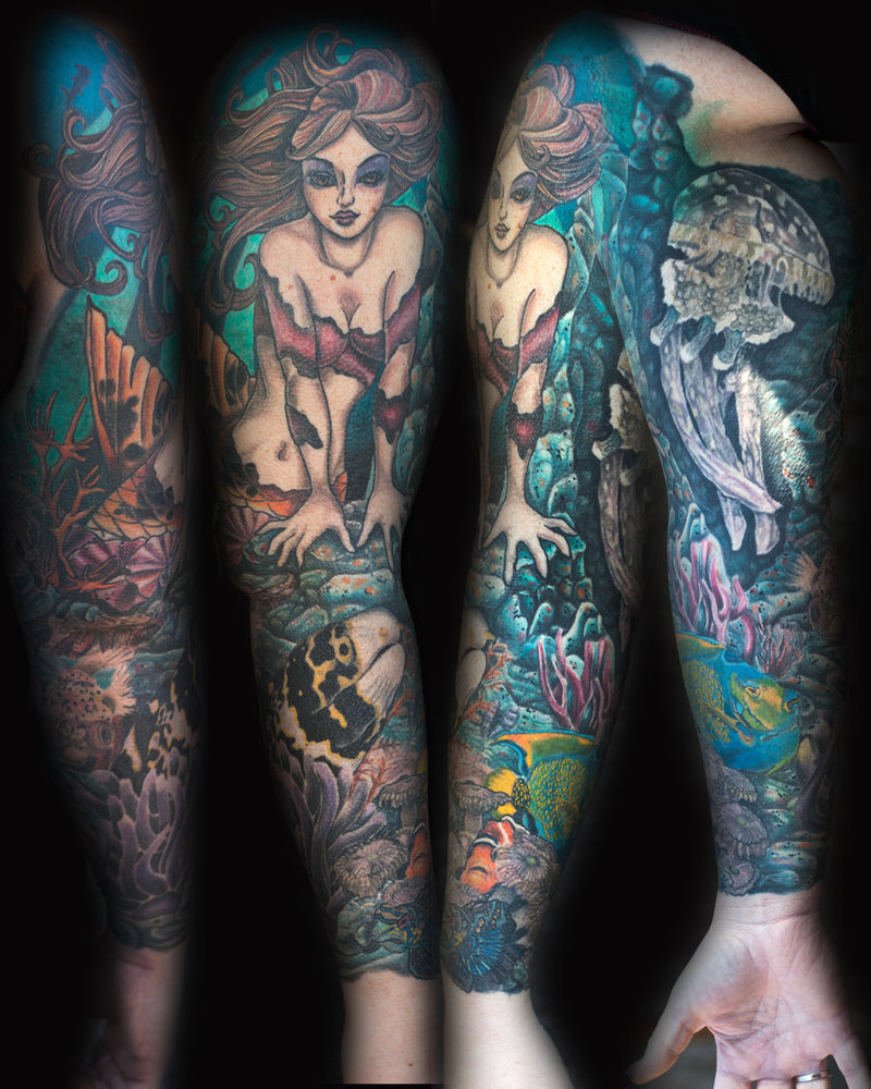 Attractive Mermaid With Fishes Tattoo On Full Sleeve